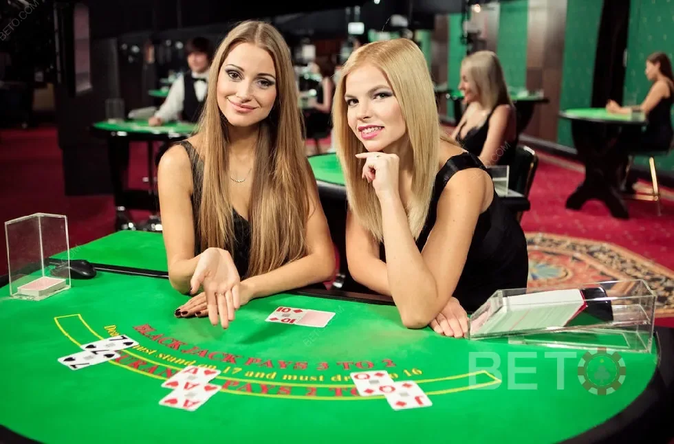 Tampilan ruang meja kasino live K3K3 dengan dealer